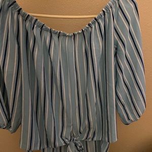 Striped, draped shoulders, quarter sleeve blouse with a short front & long back